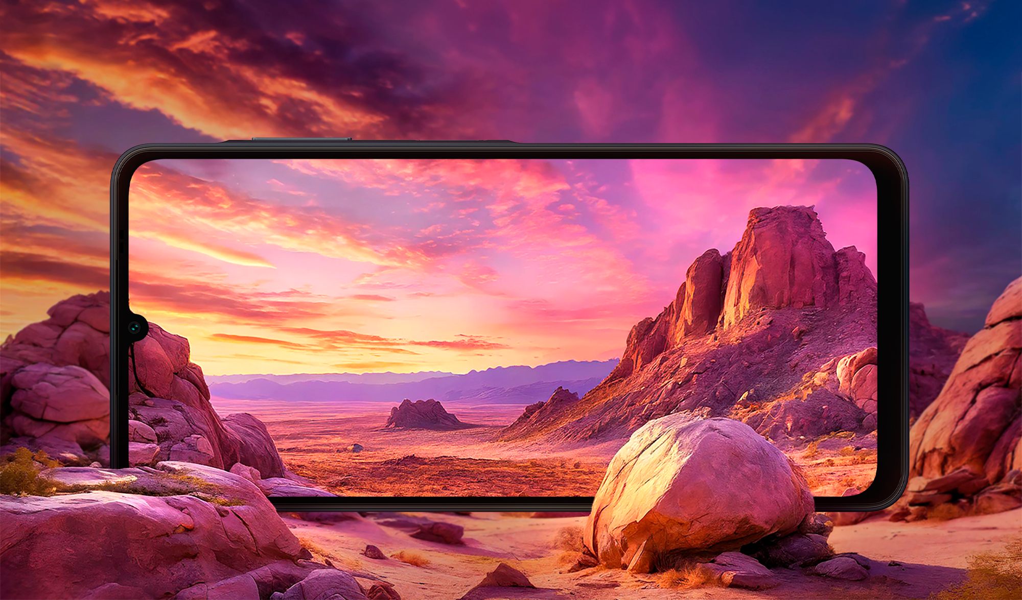 ''A tela do Galaxy A06 se mistura perfeitamente a uma paisagem desértica com formações rochosas ao fundo..